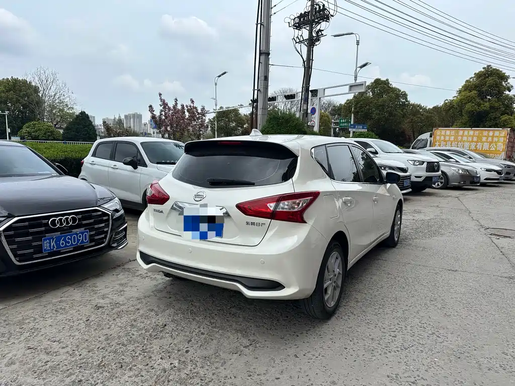 Nissan TIIDA фото 11