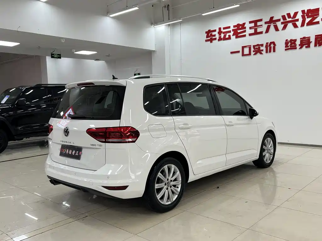 Volkswagen Touran фото 7