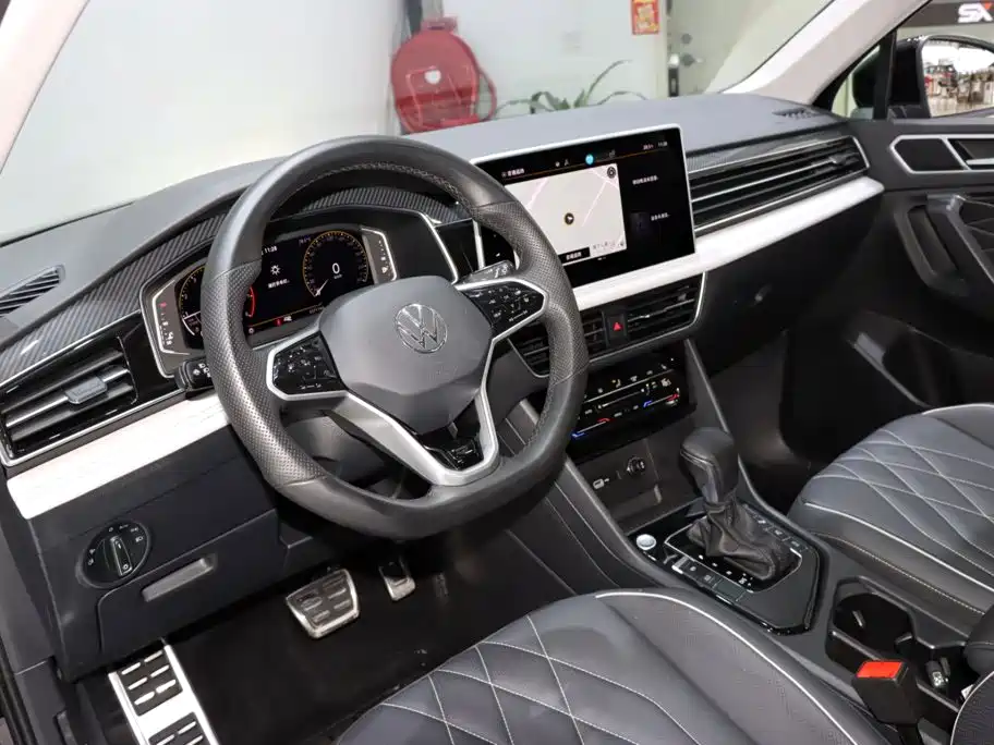 Volkswagen Tiguan L фото 10