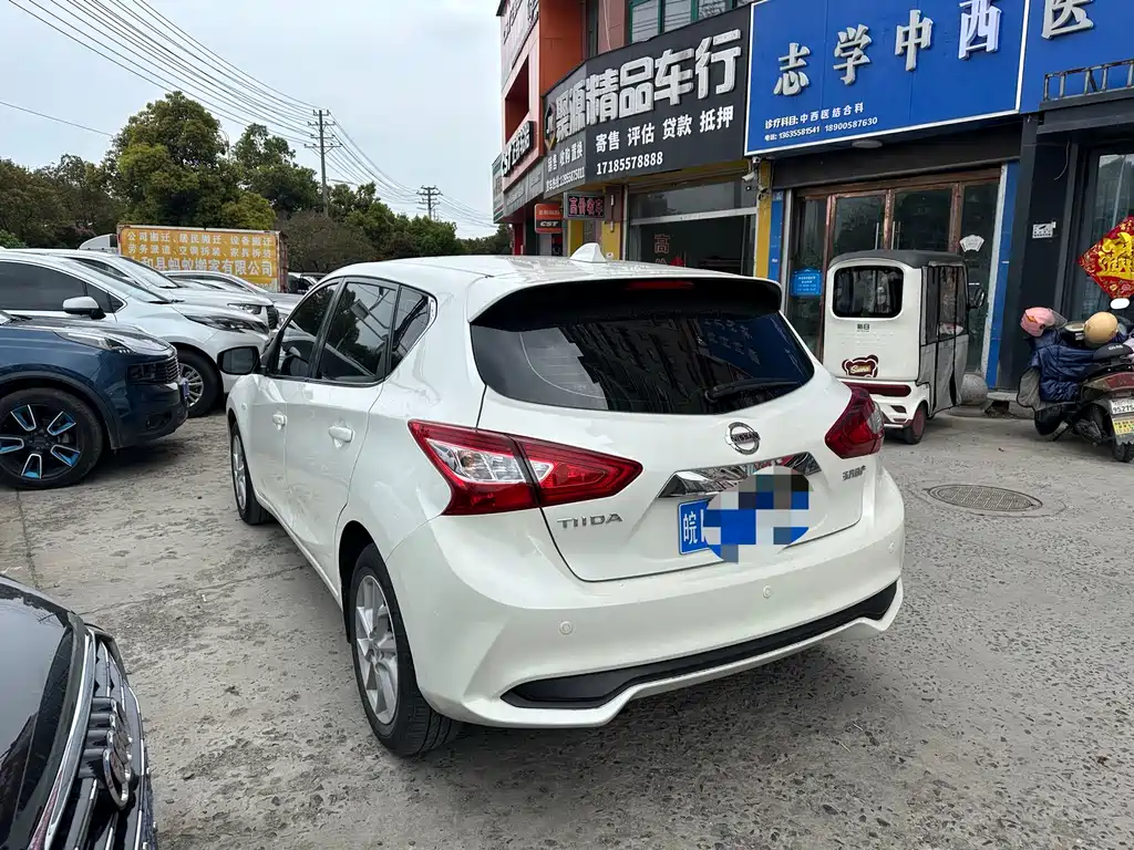 Nissan TIIDA фото 6