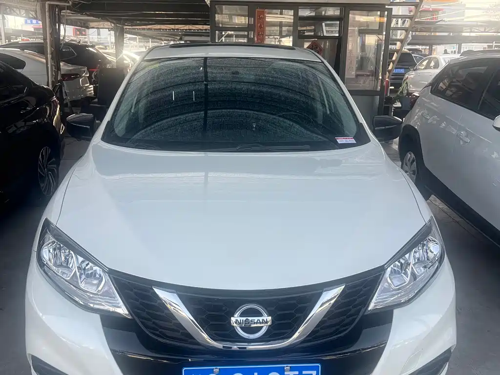 Nissan TIIDA фото 2