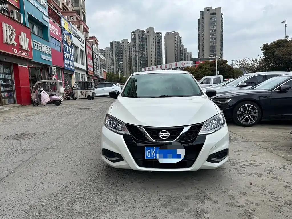 Nissan TIIDA фото 2